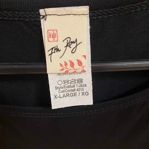 Long sleeve black shirt with sequin pocket